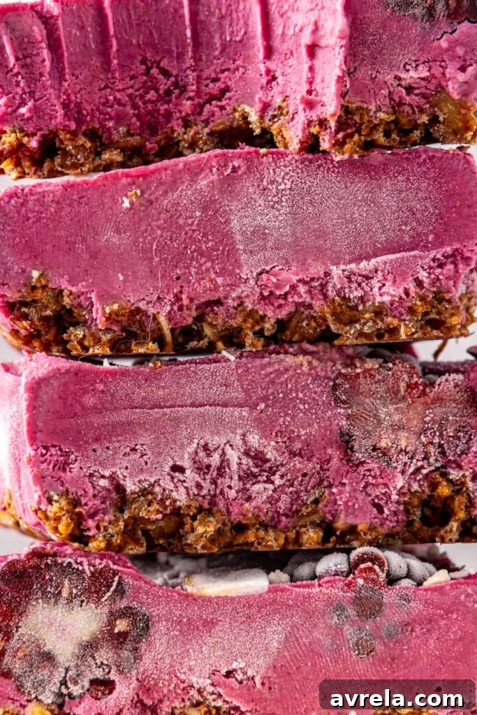 Close-up of blackberry cobbler bars layers with bite taken out