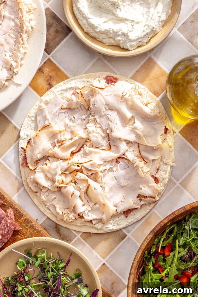 Deli turkey added to tortilla for high-protein pinwheels