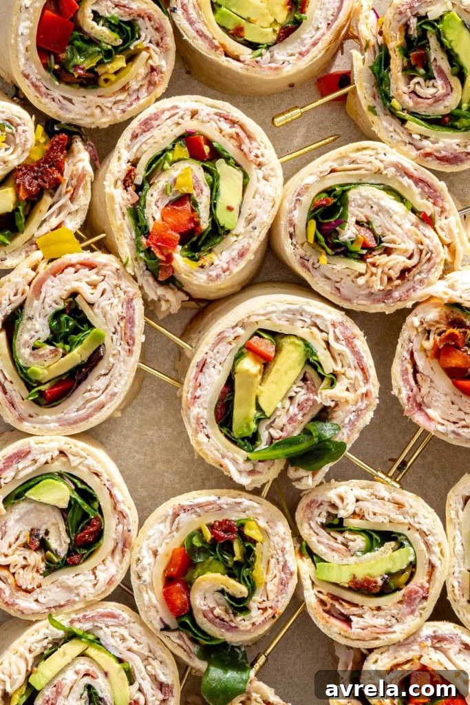 Gluten-free turkey pinwheels with cottage cheese spread and fresh vegetables