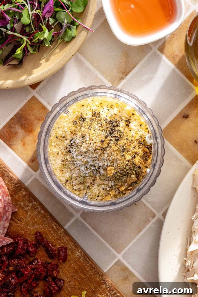 Ingredients for cacio e pepe cottage cheese spread in a blender