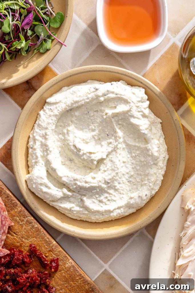 Finished cacio e pepe cottage cheese spread for turkey pinwheels