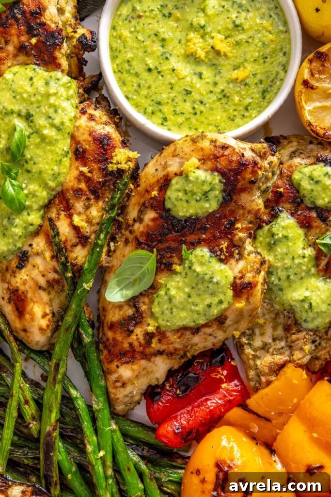 tight shot of healthy lemon pesto grilled chicken and vegetables