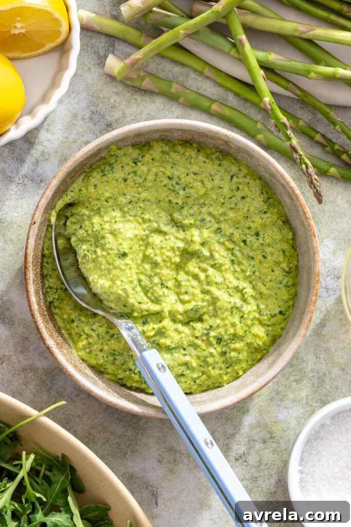 Fresh pesto sauce made with basil, lemon, garlic, and pine nuts