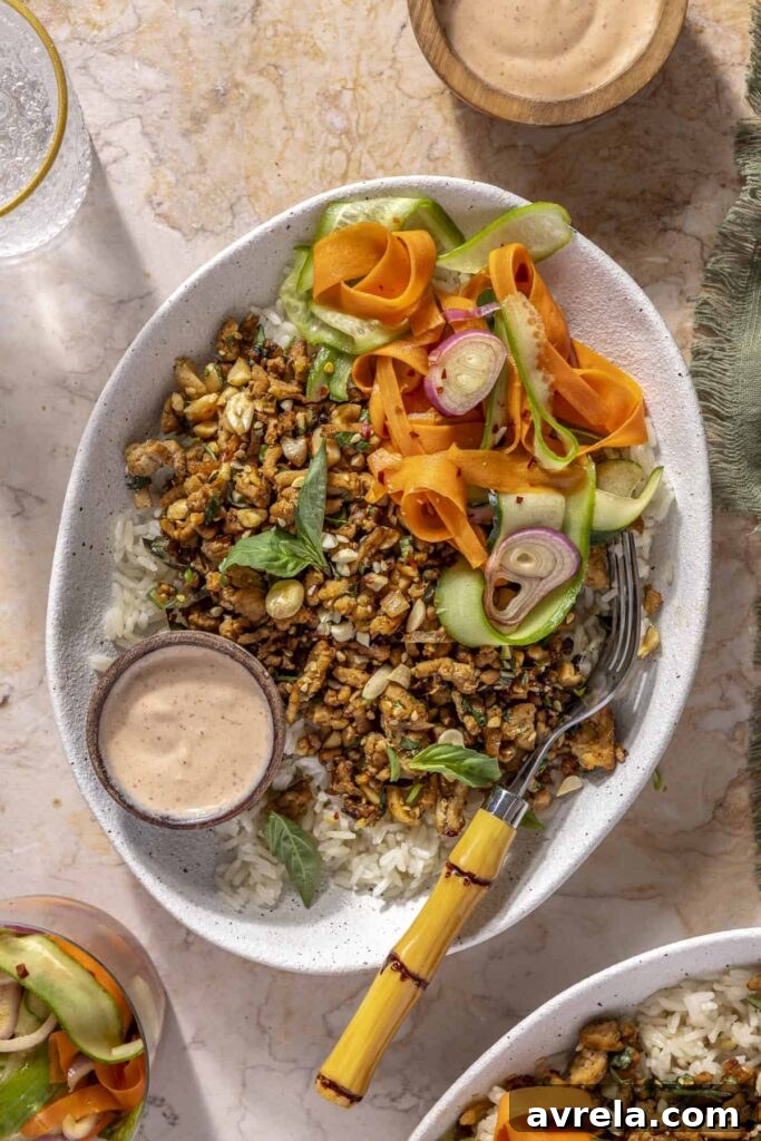 12 Delicious Gluten-Free Meal Ideas for Every Day 2 Overhead view of meal-prepped Chicken Banh Mi Bowls with jasmine rice and fresh herbs