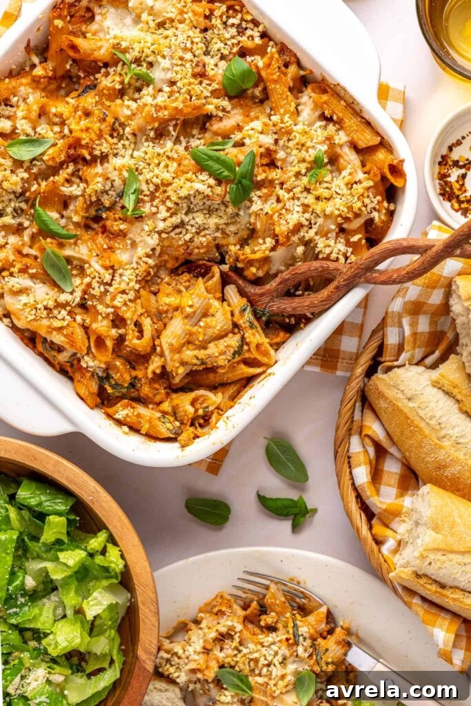 12 Delicious Gluten-Free Meal Ideas for Every Day 3 Easy baked ziti in the baking dish with a wooden spoon ready to serve