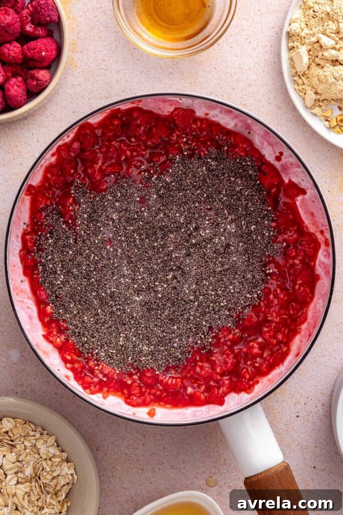 Homemade raspberry chia jam thickened with chia seeds
