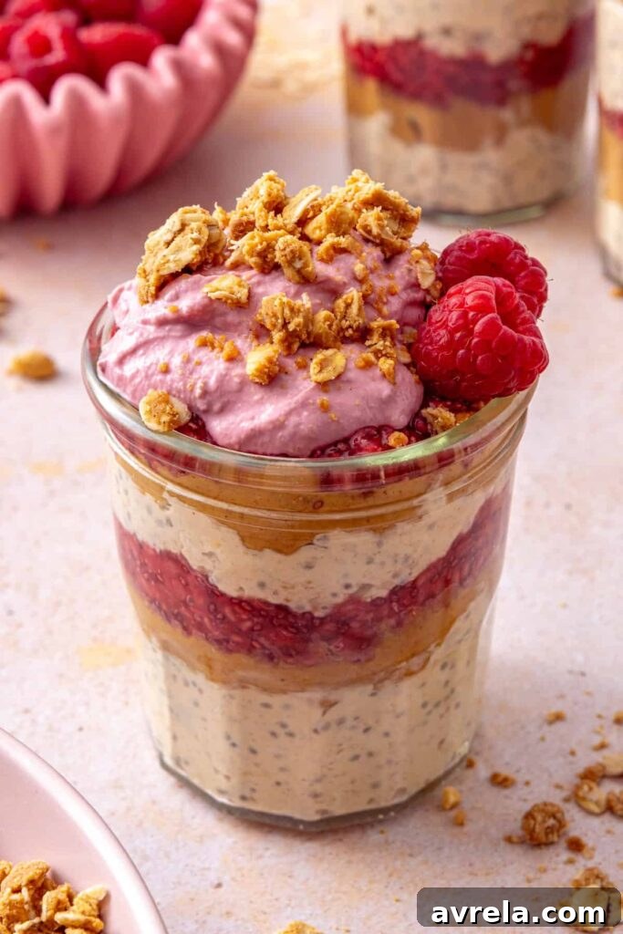High-protein peanut butter and jelly overnight oats with fresh raspberries