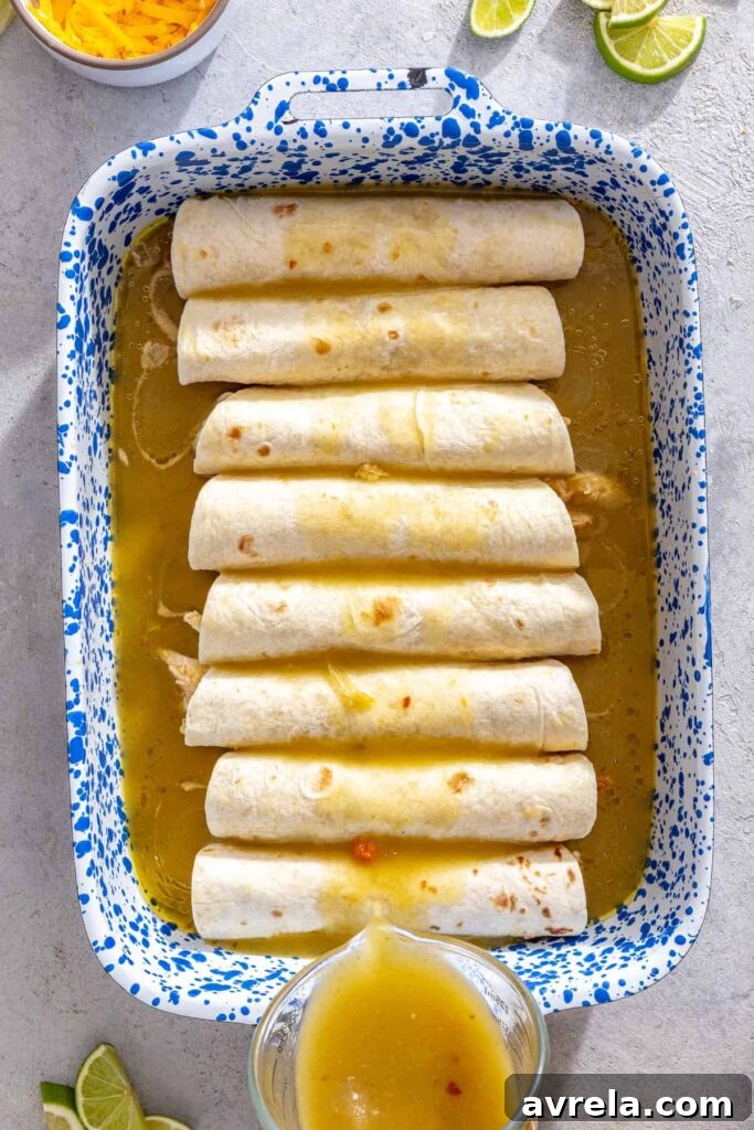 Baked Creamy Chicken Enchiladas with Salsa Verde 14 Assembled chicken enchiladas with salsa verde