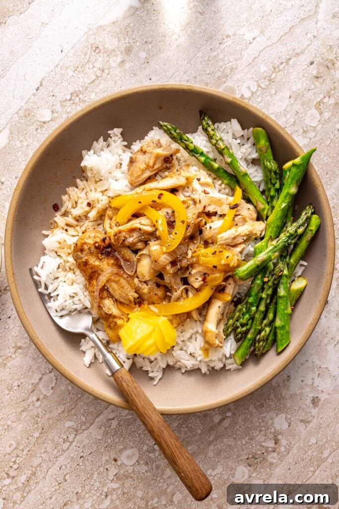 Chicken thigh rice bowl with asparagus and peppers