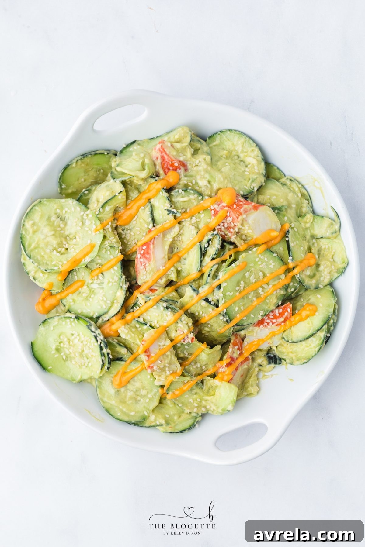 Top with extra spicy mayonnaise and sesame seeds