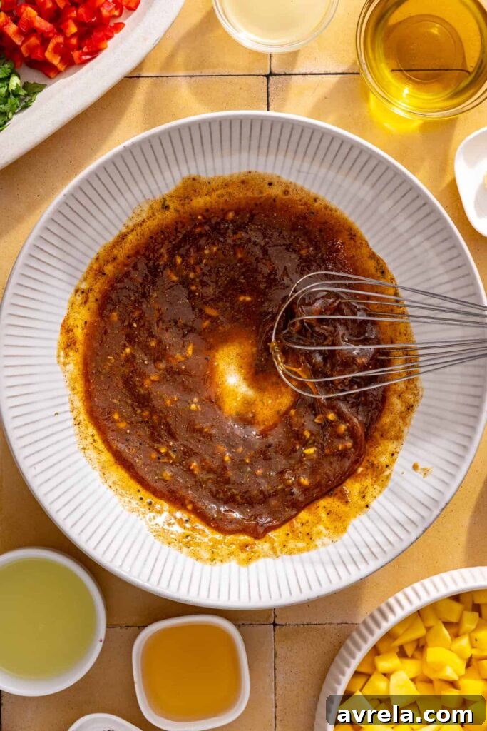 Honey lime marinade whisked together for grilled chicken with fresh lime juice, honey, garlic, and spices