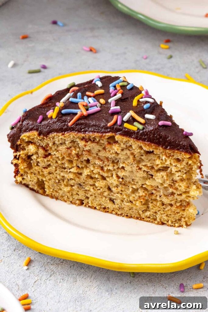 Healthy banana birthday cake slice on dessert plate