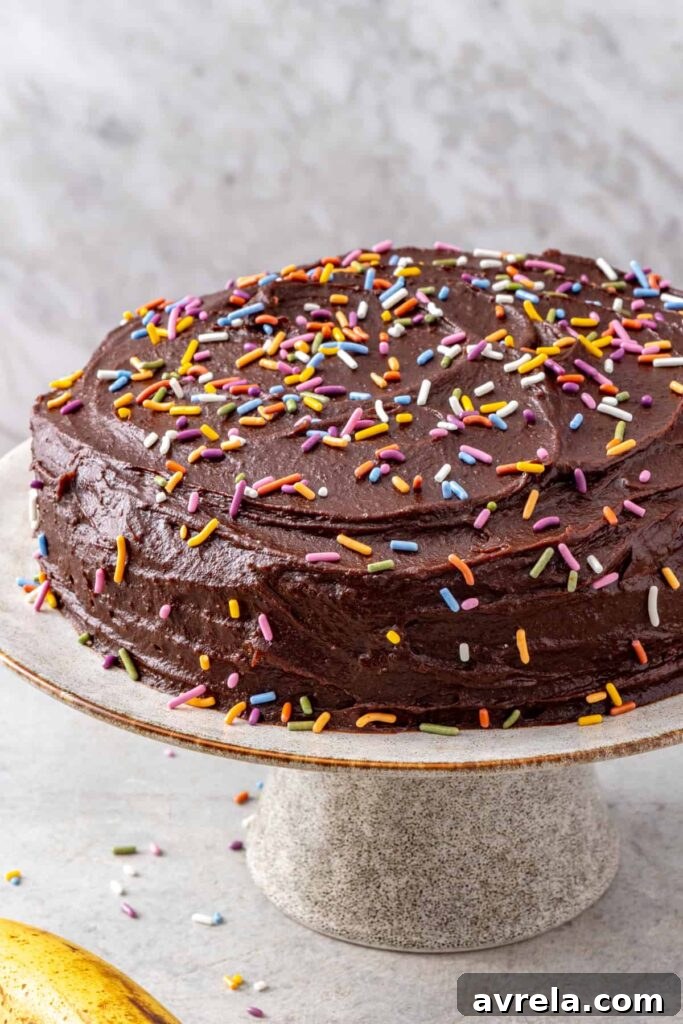 Homemade healthy banana birthday cake on a cake stand