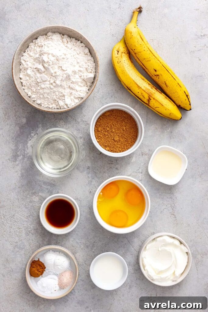 Ingredients for healthy banana birthday cake including ripe bananas, eggs, gluten-free flour and Greek yogurt