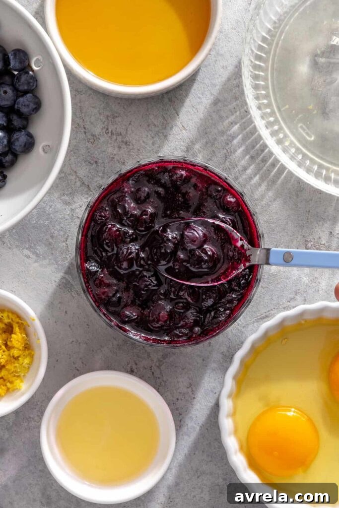 Glossy blueberry honey compote ready to serve with pancakes