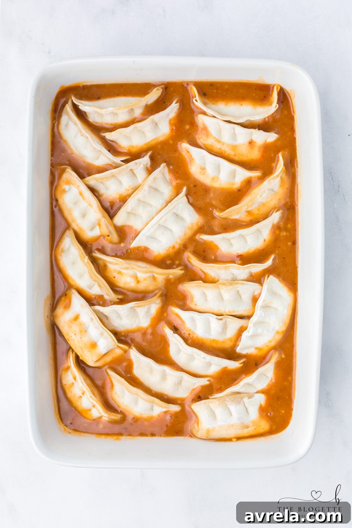 Place frozen potstickers in the sauce