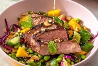 Ginger Sesame Flank Steak with Smashed Cucumber Mango Salad