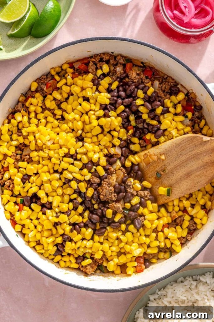 High-Protein Street Corn Taco Skillet One-Pan Dinner 11 Fire-roasted corn added to the beef and black bean taco skillet