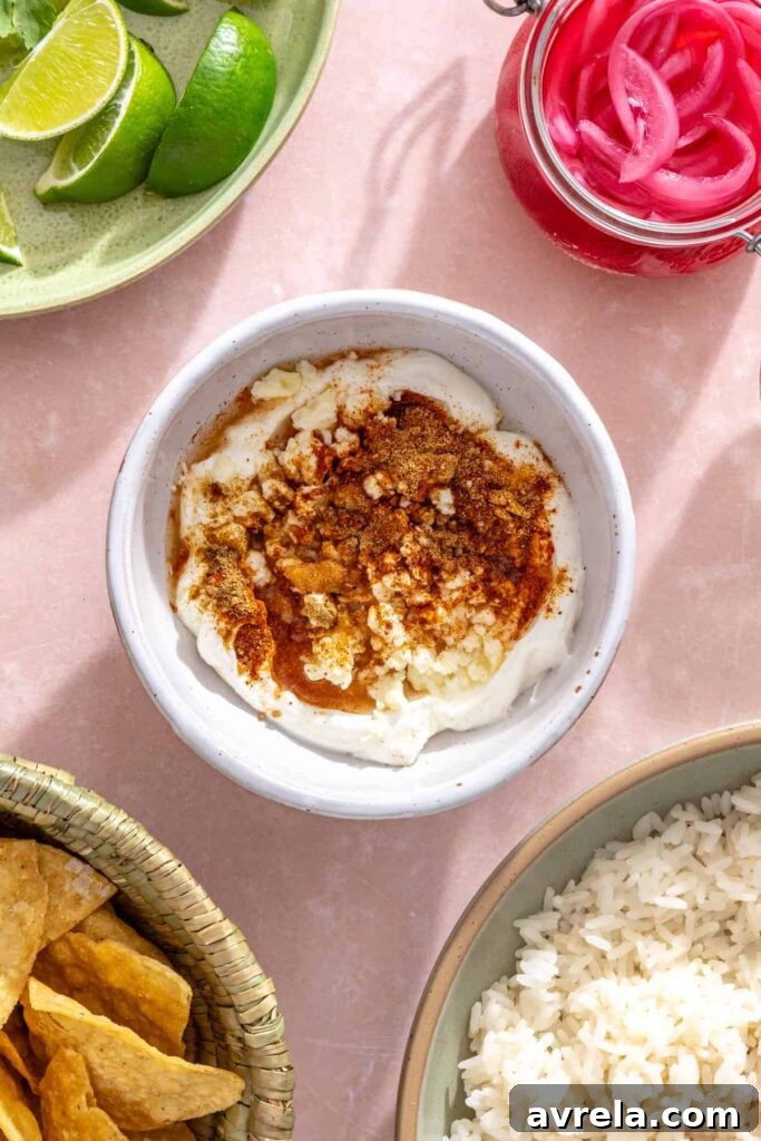 High-Protein Street Corn Taco Skillet One-Pan Dinner 13 Greek yogurt, cotija cheese, lime juice, and spices for street corn sauce