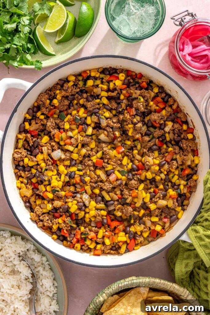 High-Protein Street Corn Taco Skillet One-Pan Dinner 6 overhead photo of the finished street corn taco skillet without garnishes, cooling on a styled table