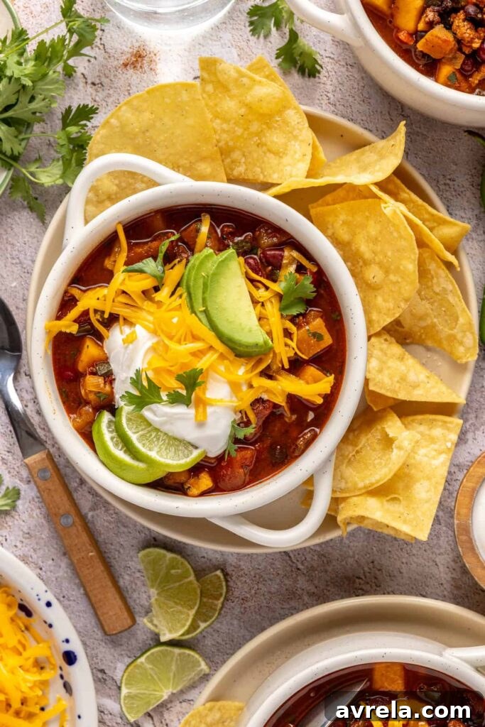 5 Comforting Soup Recipes Everyone Will Love 3 Bowl of turkey and butternut squash chili with beans and spices