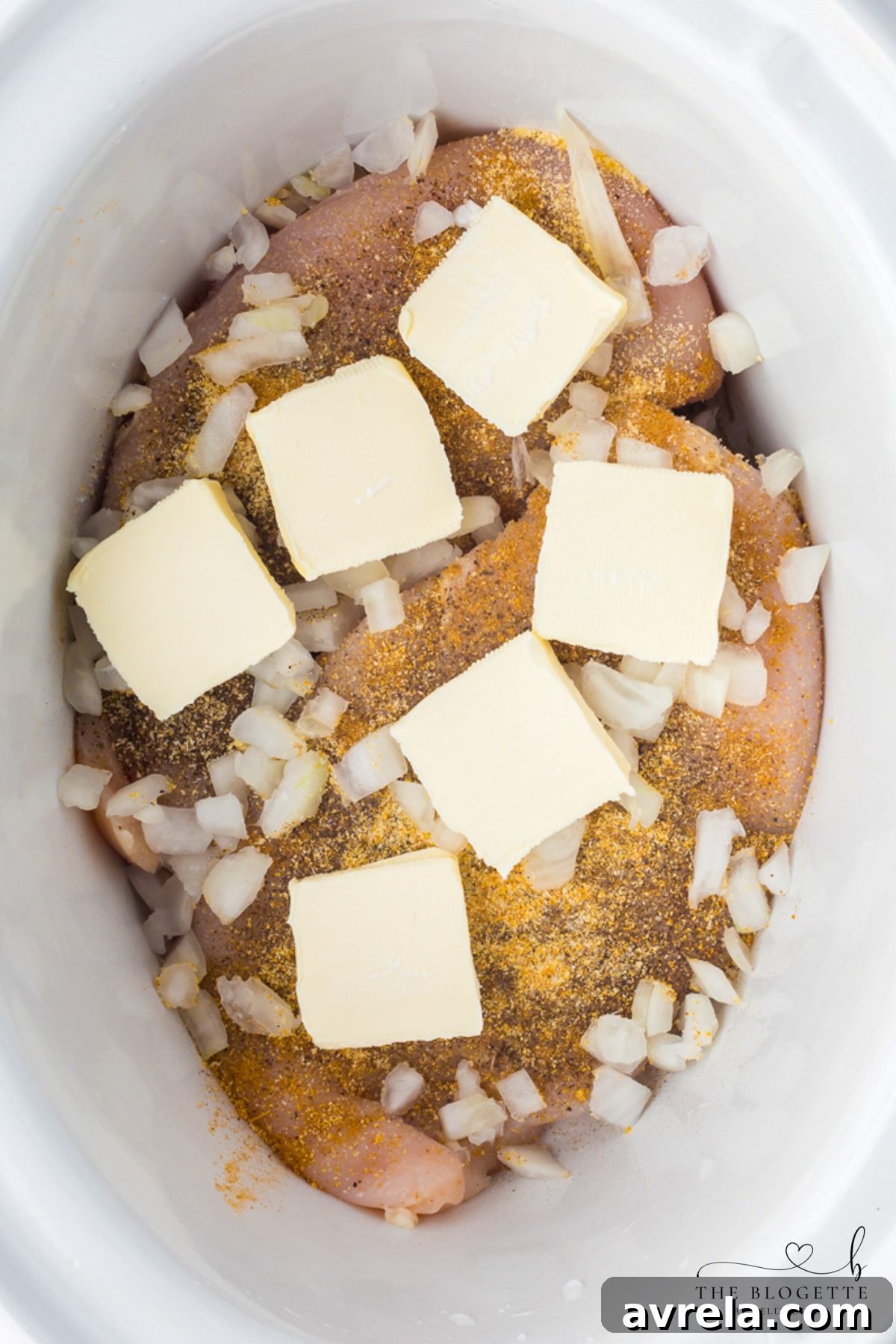Cover the chicken with butter